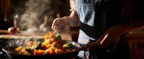 The vibrant stir-fry of fresh vegetables being prepared in a cozy kitchen. photo