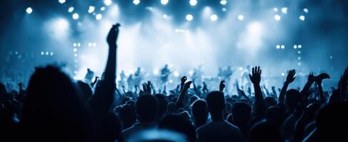 The electrifying atmosphere of a concert filled with enthusiastic fans. photo