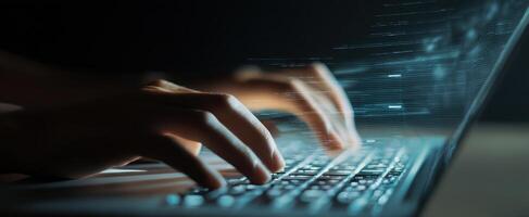 The Hands Typing Rapidly on a Laptop Keyboard in a Digital Environment photo