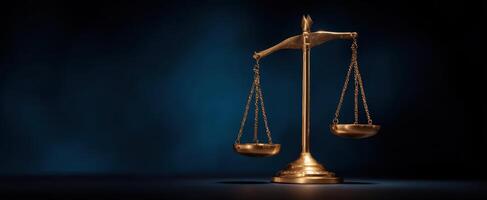 The Elegant Gold Scales of Justice on a Dark Background. photo