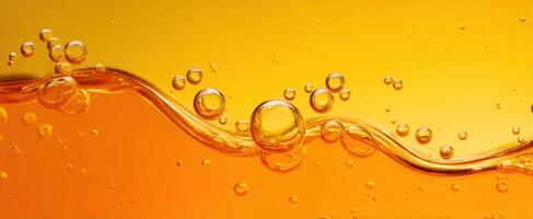The vibrant bubbles creating a wave in a refreshing orange drink. photo