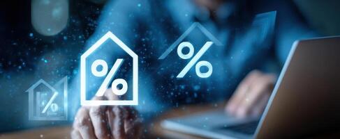 The digital financial analysis using home percentage symbols on a laptop. photo