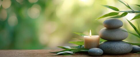 The serene arrangement of stones and candle for peaceful meditation ambiance. photo