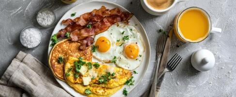 The delicious breakfast platter featuring eggs, bacon, and pancakes served elegantly. photo