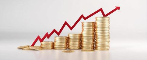 The coins stacked in increasing order with a rising growth graph. photo