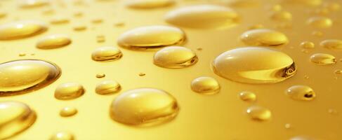 The shimmering droplets on a golden surface creating an elegant visual effect. photo