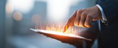 The business professional analyzing digital data trends on a modern tablet. photo