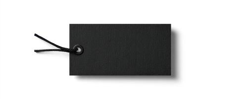The black rectangular tag with string for branding and labeling purposes. photo