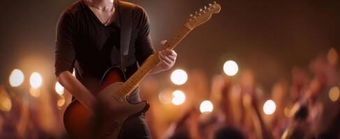 The passionate musician electrifying the crowd with a captivating guitar performance. photo
