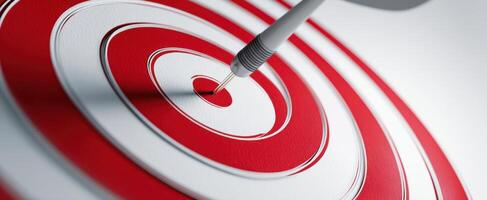 The dart striking the center of a vibrant target in bold colors photo