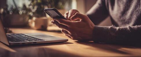 The smartphone being used for multitasking in a cozy workspace setting. photo