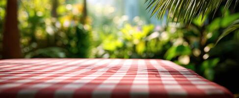 The checkered table inviting you to enjoy a peaceful outdoor dining experience. photo