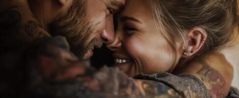 The couple sharing an intimate moment filled with love and joy. photo