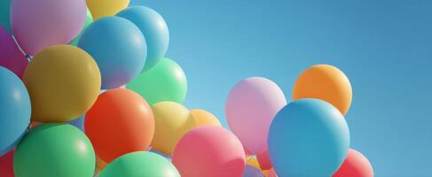 The vibrant display of colorful balloons against a clear blue sky photo