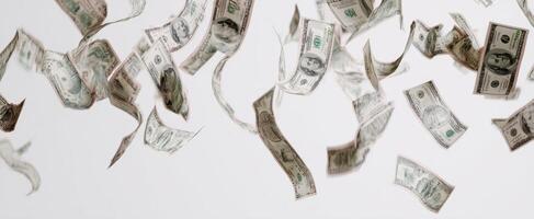 The flying dollar bills creating a sense of wealth and prosperity in the air. photo