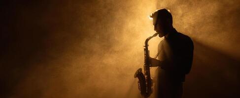 The saxophone player captivating the audience with soulful music in dramatic ambiance. photo