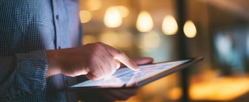 The Modern User Engaging with a Touchscreen Tablet in a Dynamic Workspace. photo