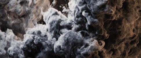 The mesmerizing movement of swirling smoke in dramatic contrast. photo