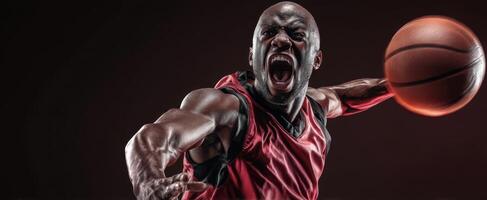 The basketball player showcasing intense athleticism and competitive spirit in action. photo