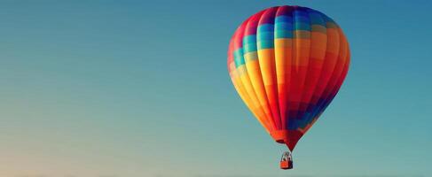 The colorful hot air balloon gracefully floating in the clear blue sky. photo