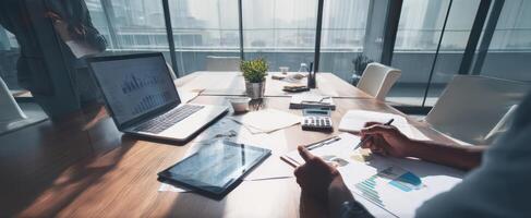 The modern office workspace featuring documents and digital devices for collaboration. photo