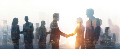 The handshake between professionals symbolizes successful collaboration in an urban skyline. photo