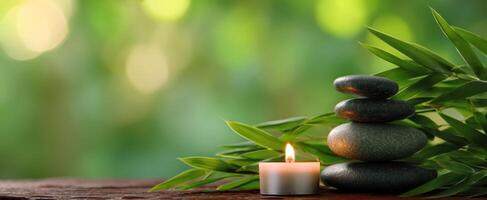 The serene arrangement of stones and candle for relaxation and wellness photo