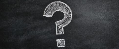 The Question Mark on a Chalkboard Symbolizing Inquiry and Curiosity photo