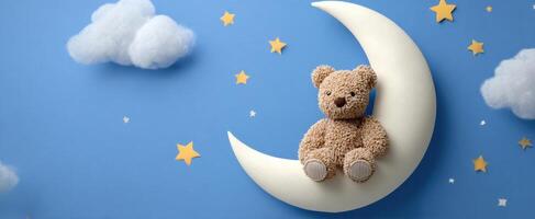 The adorable teddy bear sitting on a crescent moon against a starry sky photo