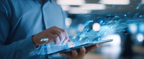 The modern user interacting with a digital tablet displaying data visualizations. photo