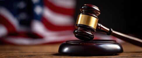 The Gavel Symbolizing Justice Against the Backdrop of the American Flag photo