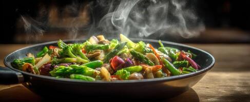 The vibrant stir-fried vegetables steaming in a black pan on a wooden table. photo