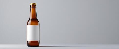 The amber beer bottle with a blank label on minimalist background. photo