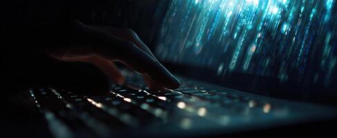 The illuminated keyboard with fingers typing in a dark technological environment. photo