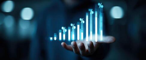 The rising bar graph demonstrating financial growth and success in business. photo