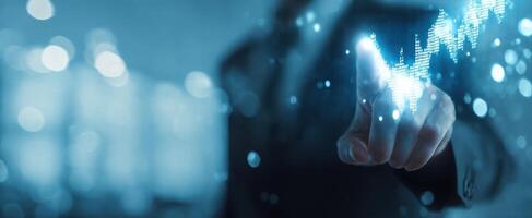 The business professional interacting with digital financial graph on screen. photo