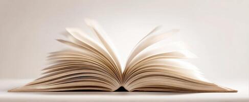 The open book displaying its pages in a minimalistic and inviting setting. photo
