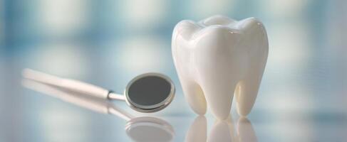 The clean and shiny dental tooth with a mirror ready for examination photo