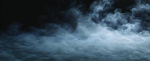 The ethereal smoke swirling in mysterious shadows and soft light. photo