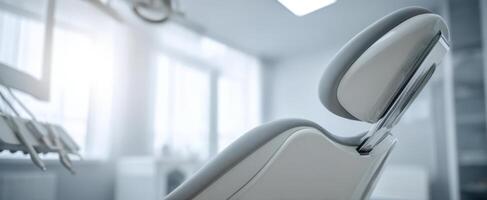 The modern dental chair in a stylish and bright dental clinic environment. photo
