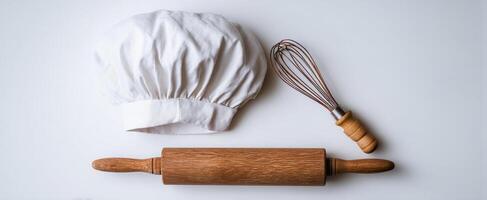 The Chef's Essentials Hat, Rolling Pin, and Whisk for Baking Delight photo