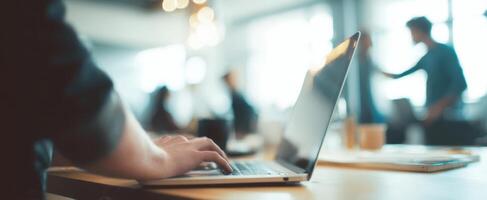 The laptop on a modern workspace captures a moment of productivity and creativity. photo