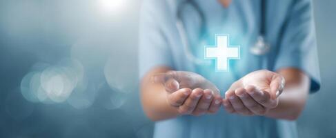 The healthcare professional offering a glowing symbol of health and wellness. photo