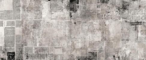 The vintage newspaper background with layered textures and abstract design elements. photo