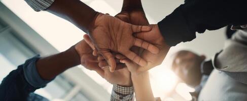 The Hands of Teamwork Coming Together in Unity and Collaboration photo