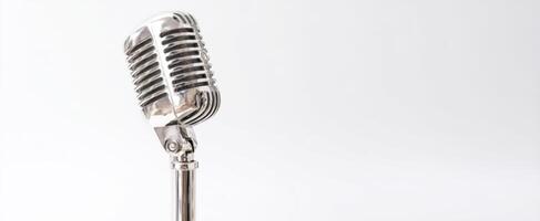The vintage microphone capturing the essence of live musical performance. photo