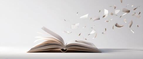 The open book with flying pages illustrating imagination and creativity. photo