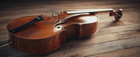 The beautiful wooden violin resting elegantly on a polished surface. photo