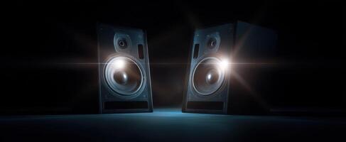 The stylish speakers with illuminated accents in a dark setting photo
