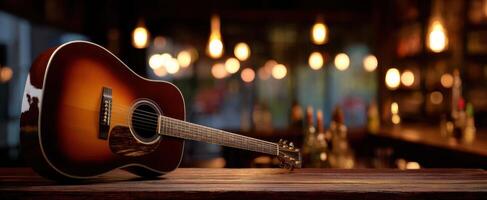 The Acoustic Guitar on a Rustic Bar Counter with Warm Lighting photo